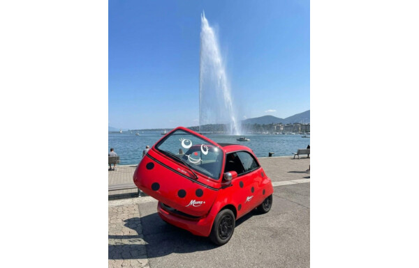 Gagnez une voiture Microlino pendant un an ainsi qu'un coffret cadeau exclusif rempli de douceurs chocolatées Munz